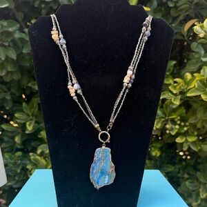 Elegant Blue Stone and Gold Pendant Necklace